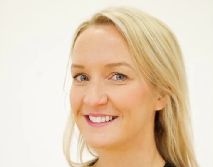 Portrait of Amanda Shearer, dance lecturer at Glasgow Kelvin College, smiling and wearing a black Glasgow Kelvin College Dance vest top against a light background. Portrait of Amanda Shearer, dance lecturer at Glasgow Kelvin College, smiling and wearing a black Glasgow Kelvin College Dance vest top against a light background.